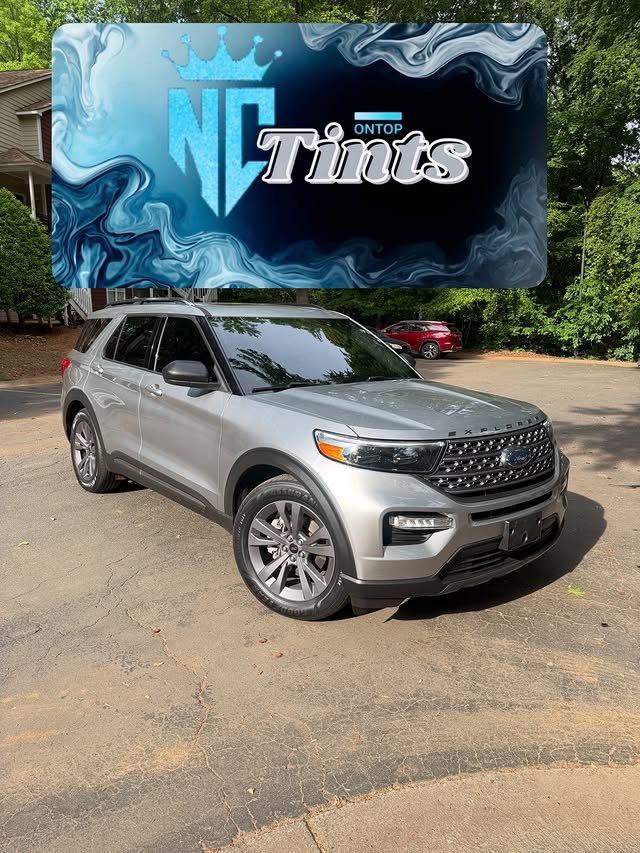 Silver Ford Explorer with premium tint install